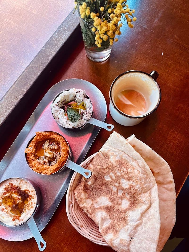 Lebanese mezze — hummus, muhammara, labneh with saj bread
